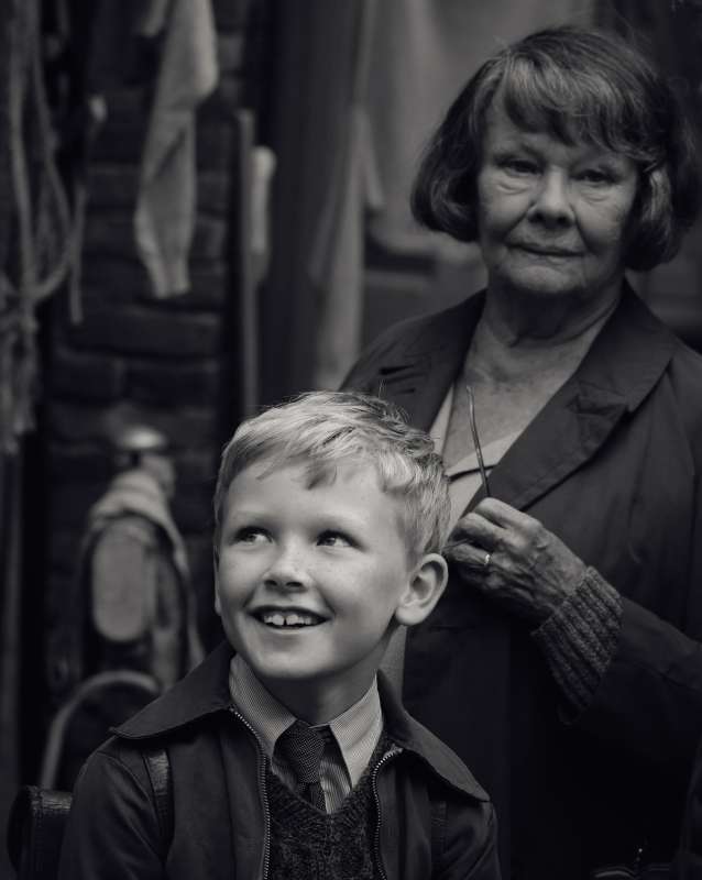 Jude Hill (left) stars as "Buddy" and Judi Dench (right) stars as "Granny" in director Kenneth Branagh's BELFAST, a Focus Features release. Credit : Rob Youngson / Focus Features